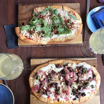 STIRR - Chimichurri meat lovers flatbread and Sweet n Spicy Chicken Flatbread along with mimosas! - Cocktail Bars Near Me - Dallas, Texas STIRR - Chimichurri meat lovers flatbread and Sweet n Spicy Chicken Flatbread along with mimosas! - Cocktail Bars Near Me - Dallas, Texas