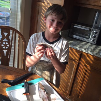 Rock On Charters - Rex after he gutted and filleted his sea mullet! - Fishing Near Me