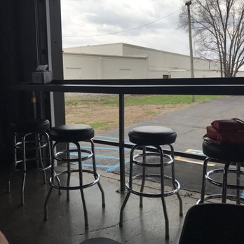 Black Circle - Inside bar becomes outside bar with the garage door up. - Breweries Near Me - Indianapolis, Indiana