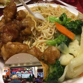 Sizzling Wok - a plate of noodles and meat - Fast Food Near Me - Kamloops, British Columbia Sizzling Wok - a plate of noodles and meat - Fast Food Near Me - Kamloops, British Columbia