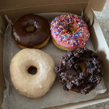 OMG Donuts & Bakery - Flavors: Chocolate icing, Strawberry with Sprinkles, Maple Frosted, and Chocolate Brownie - Donuts Near Me - Concord, North Carolina OMG Donuts & Bakery - Flavors: Chocolate icing, Strawberry with Sprinkles, Maple Frosted, and Chocolate Brownie - Donuts Near Me - Concord, North Carolina