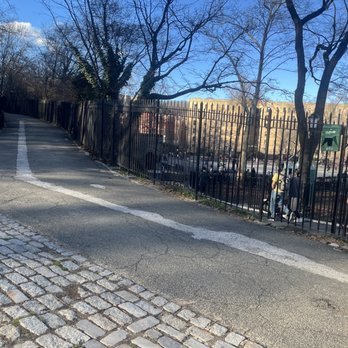 Fort Tryon Park - You can go into the kitty park or continue up the ramp to walk the rest way. - Parks Near Me - New York, New York Fort Tryon Park - You can go into the kitty park or continue up the ramp to walk the rest way. - Parks Near Me - New York, New York
