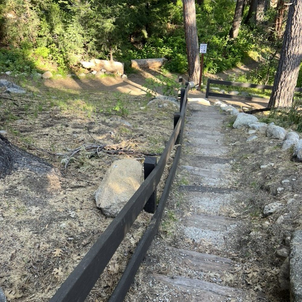 Strawberry Creek Inn - The stairs down to the path. Not bad. A big step at the bottom. A sign to direct you away from the dead end toward town! - Hotels Near Me - Idyllwild, California