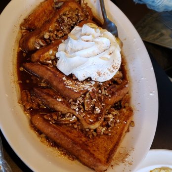 The Pancakery - Bananas Foster French Toast. Looks good. But that broken sauce was disappointing and it's just swimming in butter - Breakfast & Brunch Near Me - Destin, Florida
