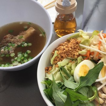 RiceString Noodle Shack - Mekala with side of hearty pork bone broth and garlic fish sauce - Cambodian Near Me - Cerritos, California RiceString Noodle Shack - Mekala with side of hearty pork bone broth and garlic fish sauce - Cambodian Near Me - Cerritos, California