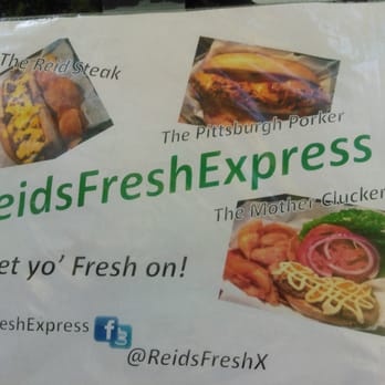 Reids Fresh Express - a sign in a store window - Food Trucks Near Me Reids Fresh Express - a sign in a store window - Food Trucks Near Me