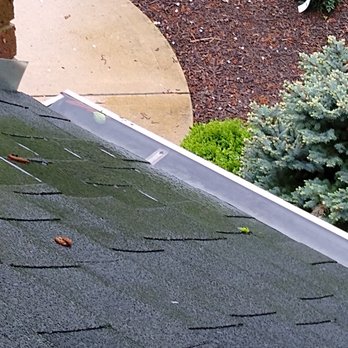 Ernest Windows - 5/17/20 rain in clogged gutter overflowing to the front. - Window Washing Near Me - Bartlett, Illinois