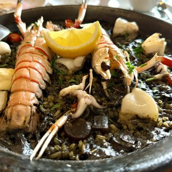 El Cielo - Squid ink Paella Negra with Langistino, Calamari - Tapas Bars Near Me - Honolulu, Hawaii El Cielo - Squid ink Paella Negra with Langistino, Calamari - Tapas Bars Near Me - Honolulu, Hawaii