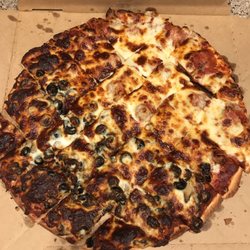 Red's Savoy Pizza - It's burnt, yet cold. Crust was black underneath.