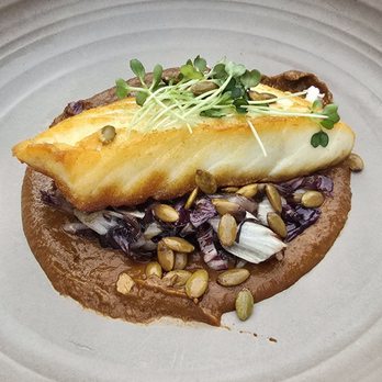Esteban Restaurant - Halibut on a Mole bed with Pepitas - Spanish Near Me - Monterey, California Esteban Restaurant - Halibut on a Mole bed with Pepitas - Spanish Near Me - Monterey, California