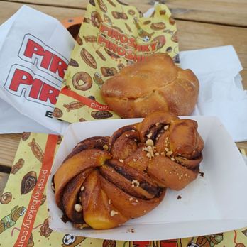 Piroshky Piroshky - (Top) BBQ pork Piroshky, (bottom) Cardamom & Cinnamon Piroshky - Bakeries Near Me - Seattle, Washington Piroshky Piroshky - (Top) BBQ pork Piroshky, (bottom) Cardamom & Cinnamon Piroshky - Bakeries Near Me - Seattle, Washington