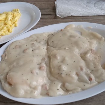 Eggs Up Grill - Biscuits with gravy and a side of eggs. - Breakfast & Brunch Near Me - Winter Garden, Florida Eggs Up Grill - Biscuits with gravy and a side of eggs. - Breakfast & Brunch Near Me - Winter Garden, Florida