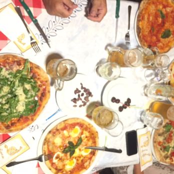 Tavernetta Oasi - The feast at our table. - Pizza Near Me - Modica, RG