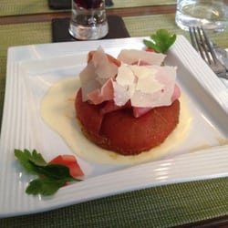 Le Chef Et Sa Femme - Stewed tomato appetizer with Parmesan and ham in a Parmesan cream sauce.