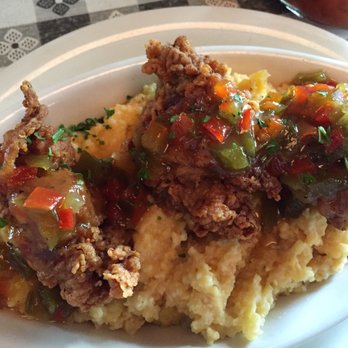 Forest Hill Grill - Very good. It's a special app. Bacon wrapped fried chicken livers with cheese grits and a 5 pepper jelly. It's good. - American Near Me - Germantown, Tennessee Forest Hill Grill - Very good. It's a special app. Bacon wrapped fried chicken livers with cheese grits and a 5 pepper jelly. It's good. - American Near Me - Germantown, Tennessee