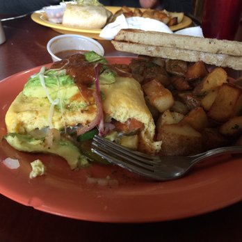Squeeze In - Created my own omelette- zucchini, tomato, red onion, jack cheese, jalapeño and avocado with the tomato pesto sauce. - Breakfast & Brunch Near Me - Truckee, California Squeeze In - Created my own omelette- zucchini, tomato, red onion, jack cheese, jalapeño and avocado with the tomato pesto sauce. - Breakfast & Brunch Near Me - Truckee, California