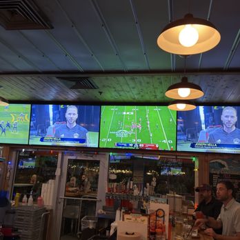 Hooters - Two TVs with a soccer clinic on it??? - American Near Me - Clearwater, Florida