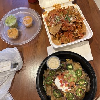 Electric Burrito - Nacho comparison: top is Electric Burrito ($14 including chicken protein) and bottom is Dos Caminos ($24 no protein) - Breakfast & Brunch Near Me - New York, New York Electric Burrito - Nacho comparison: top is Electric Burrito ($14 including chicken protein) and bottom is Dos Caminos ($24 no protein) - Breakfast & Brunch Near Me - New York, New York