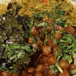 Jallof rice, Sofrito Sauce, Grilled Salmon, Grilled Shrimp, Curry Cabbage, Collard Greens, Bbq chickpeas