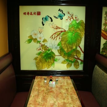 August Moon - a table and chairs in a restaurant - Chinese Near Me - Murray, Kentucky