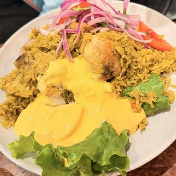 The Freakin Incan - Arroz con pollo - papa à la huancaina extra but we had asked to add it on the plate as they go together. - Food Trucks Near Me - Roswell, Georgia The Freakin Incan - Arroz con pollo - papa à la huancaina extra but we had asked to add it on the plate as they go together. - Food Trucks Near Me - Roswell, Georgia