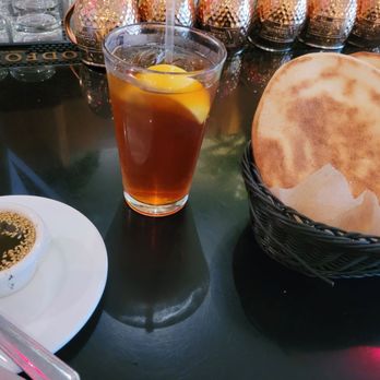 Sitti - Pita bread with seasoned olive oil. Unsweetened iced tea. - Lebanese Near Me - Raleigh, North Carolina Sitti - Pita bread with seasoned olive oil. Unsweetened iced tea. - Lebanese Near Me - Raleigh, North Carolina