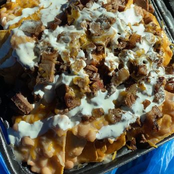 Luis' Butcher Shop - Brisket Nachos: Beans, Brisket, Cheese and Sour Cream. No pico de Gallo - Meat Shops Near Me - Downey, California Luis' Butcher Shop - Brisket Nachos: Beans, Brisket, Cheese and Sour Cream. No pico de Gallo - Meat Shops Near Me - Downey, California