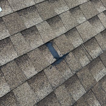 Best Roof Contracting - hole in roof attic under black tar - Roofing Near Me - Staten Island, New York