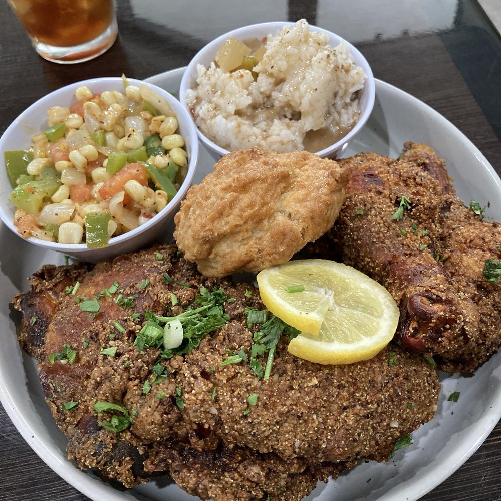 Blue Plate - 4 piece fried chicken with two side dishes of rice and gravy and maque choux with a biscuit. $21 - Cajun/Creole Near Me - Phoenix, Arizona