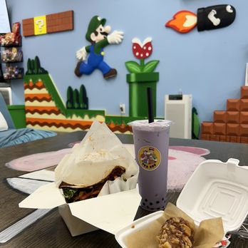 Tea Bro - a cup of coffee and a sandwich on a table - Bubble Tea Near Me - Plantation, Florida Tea Bro - a cup of coffee and a sandwich on a table - Bubble Tea Near Me - Plantation, Florida