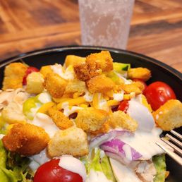 a salad with croutons and tomatoes a salad with croutons and tomatoes