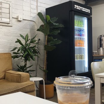 Landmark Coffee - Iced vanilla oat milk latte - Coffee & Tea Near Me - Redlands, California