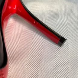 Deep cut in the heel was painted over instead of being repaired. I couldn't get a good angle