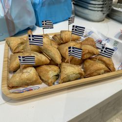 Gyro World - Samples of spinach and cheese pies. Spinach was delicious!!