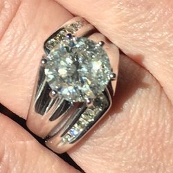 F.A.O. Jewelers - Beautiful 3.03 diamond with wedding band.  Phone picture can't do it justice.