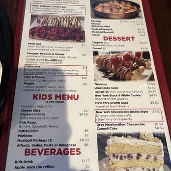Amici Pizza - The menu from Amici Pizza displays sections for subs, sides, desserts, kids menu, and beverages. Items include Philly Sub, Italian Mix, and Ham & Cheese, with prices ranging from $9 to $13. The dessert section features Tiramisu, Limoncello Cake, and New York Cheesecake Brulee Style, priced between $4.50 and $7.50. Beverages include kids drinks, apple juice, and fountain soda. The menu emphasizes Italian-inspired dishes and desserts, with detailed descriptions and prices. - Pizza Near Me - Mesa, Arizona