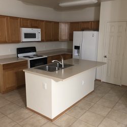 Ohana Navy Family Housing - Kitchen with island and new appliances (except stove - currently on the waitlist for a new one)