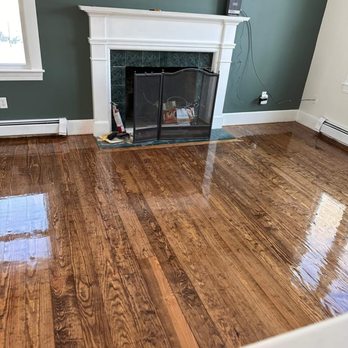 Bunker Hill Floors - a fireplace in a living room - Flooring Near Me