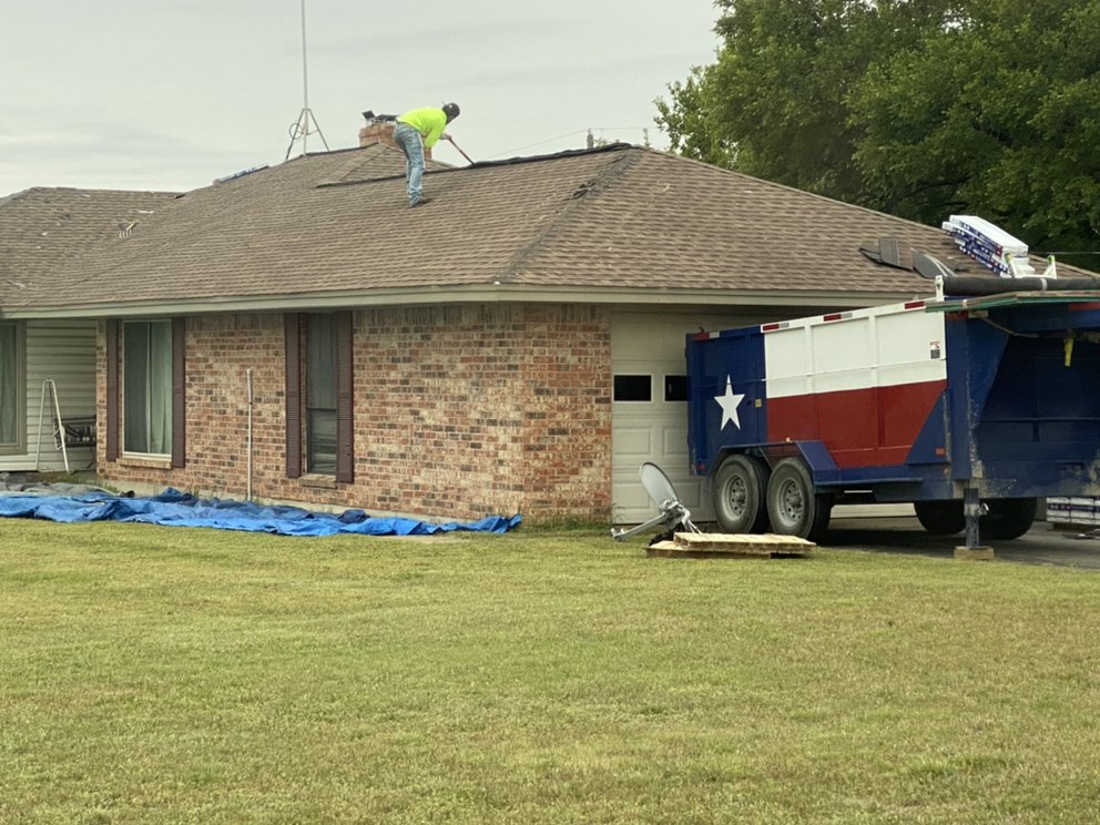 Slide of Meglins Roofing and General Contractor