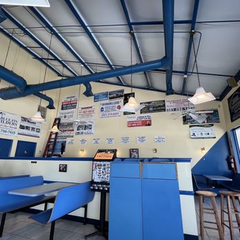 Sandwich Man Pizza Too - the interior of a restaurant - Breakfast & Brunch Near Me - Delray Beach, Florida Sandwich Man Pizza Too - the interior of a restaurant - Breakfast & Brunch Near Me - Delray Beach, Florida