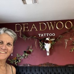 Bloodline Tattoo - A shot of the inside and a happy client!