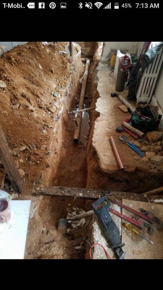 Slide of UpHill Plumbers Services