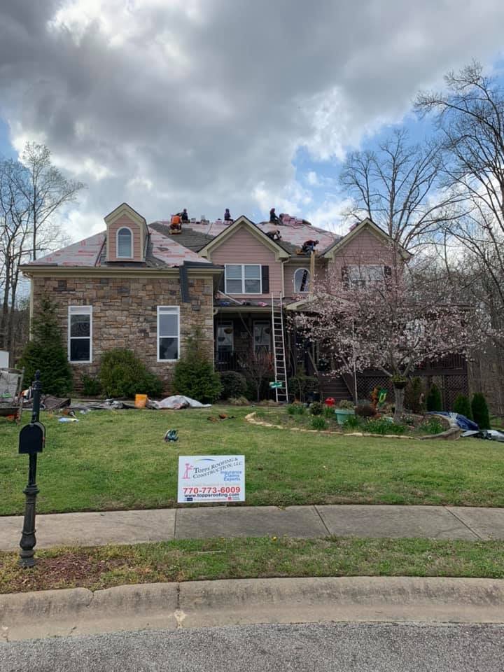 Slide of Topps Roofing & Construction