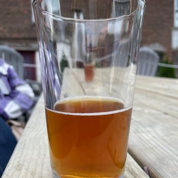 Slickfin Brewing Company - a glass of beer on a table - Breweries Near Me - Fort Edward, New York Slickfin Brewing Company - a glass of beer on a table - Breweries Near Me - Fort Edward, New York