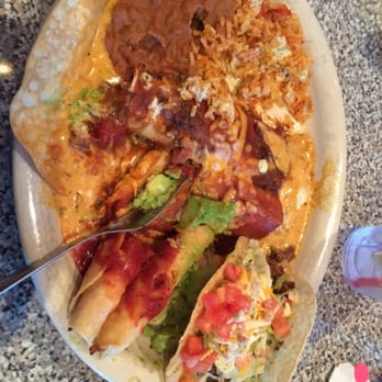 Chuy's - I think this was the #1 combo - 2 chicken taquitos, cheese enchilada, rice, taco, guac, beans, and enough deliciousness for a small family. - Tex-Mex Near Me - Fairfax, Virginia