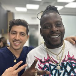 Miami Cosmetic Smile Design - Dr. Fundora with his happy porcelain veneers smile design patient !