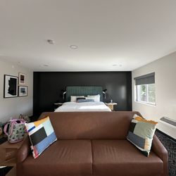 Bedroom area behind living room
