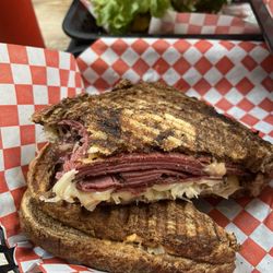Minden Meat & Deli - Ruben Reuben Panini Sandwich (minus one bite)