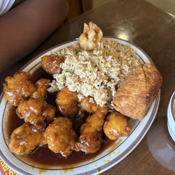 First Wok - orange chicken and fried rice, lunch special with an eggroll and crab rangoon - Chinese Near Me - Grand Rapids, Michigan First Wok - orange chicken and fried rice, lunch special with an eggroll and crab rangoon - Chinese Near Me - Grand Rapids, Michigan