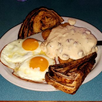 Lake-Aire Restaurant - "Chicken fried pork" with sausage gravy, eggs, and marble rye. - Breakfast & Brunch Near Me - Lake Geneva, Wisconsin Lake-Aire Restaurant - "Chicken fried pork" with sausage gravy, eggs, and marble rye. - Breakfast & Brunch Near Me - Lake Geneva, Wisconsin